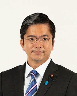 金子容三